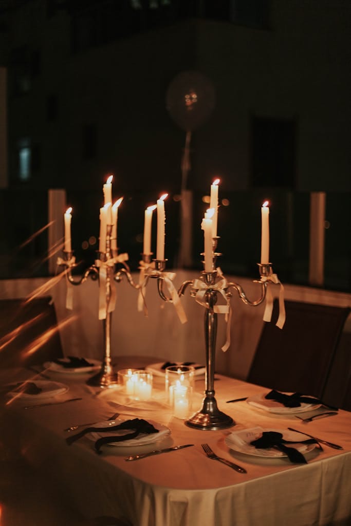 Charming candlelit dinner table arrangement perfect for romantic evenings and intimate gatherings.